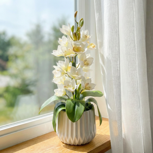 Sztuczny storczyk w ceramicznej doniczce 