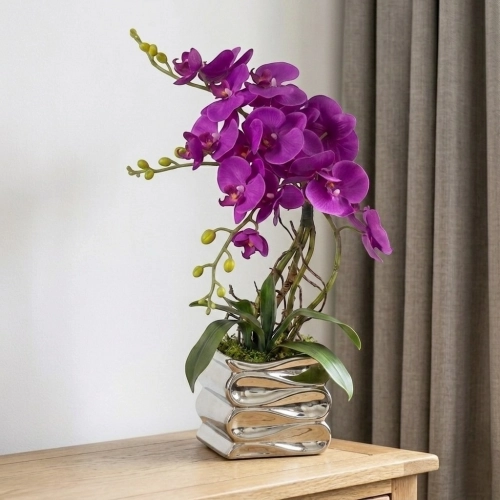 Sztuczny storczyk w ceramicznej doniczce  